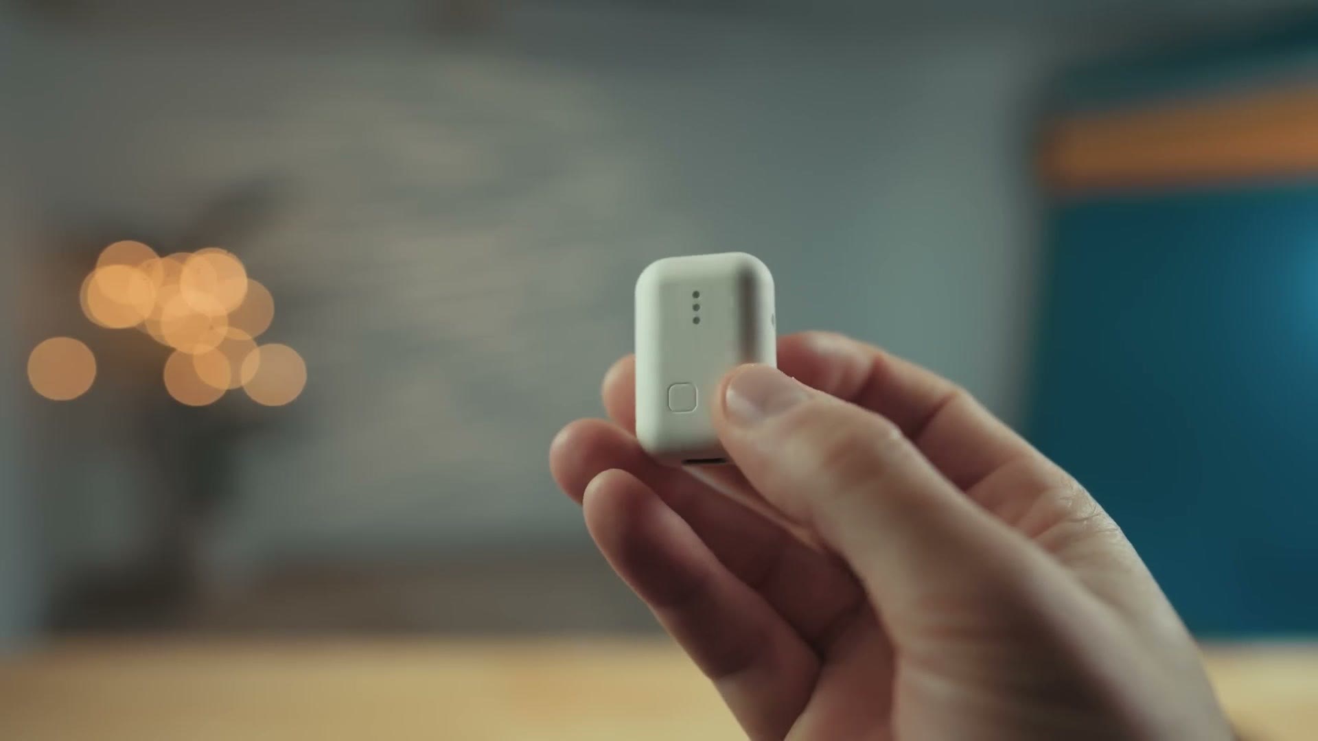 White Instamic Pro Plus C held between two fingers