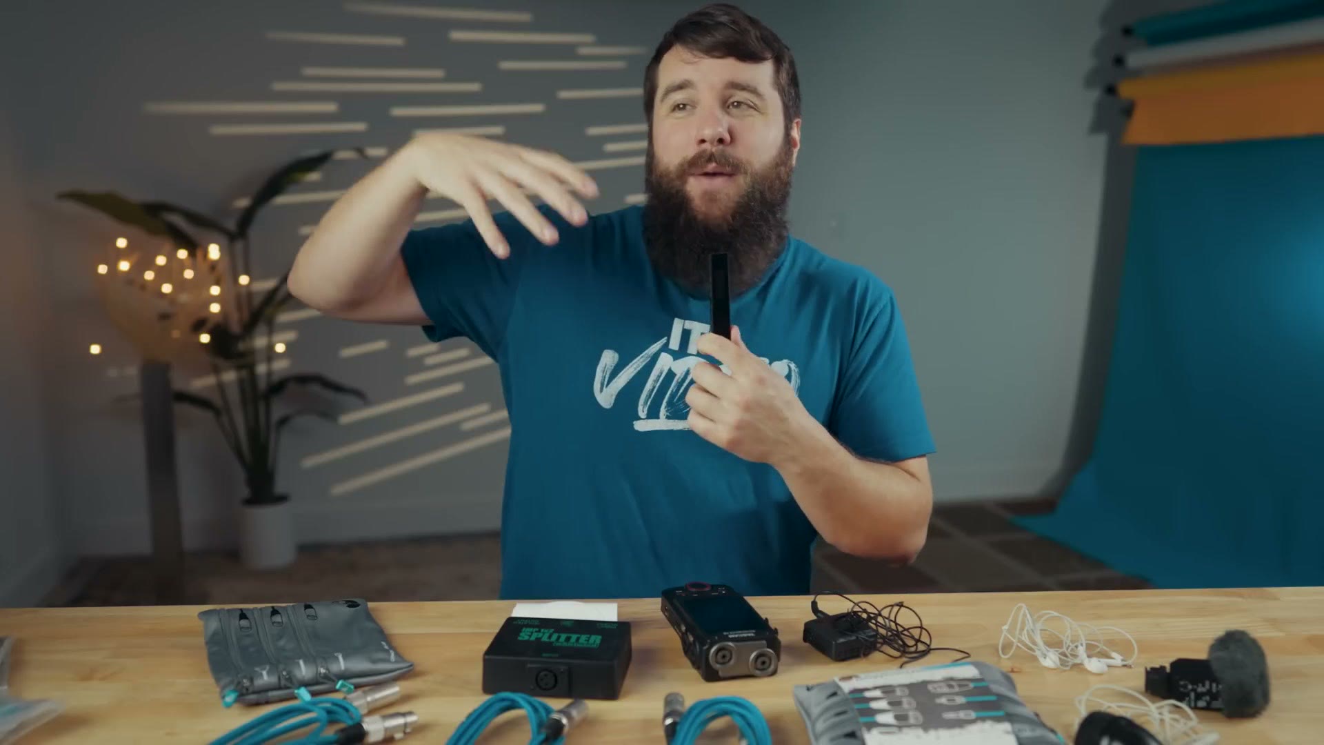 A microphone sleeve being fitted over a handheld microphone