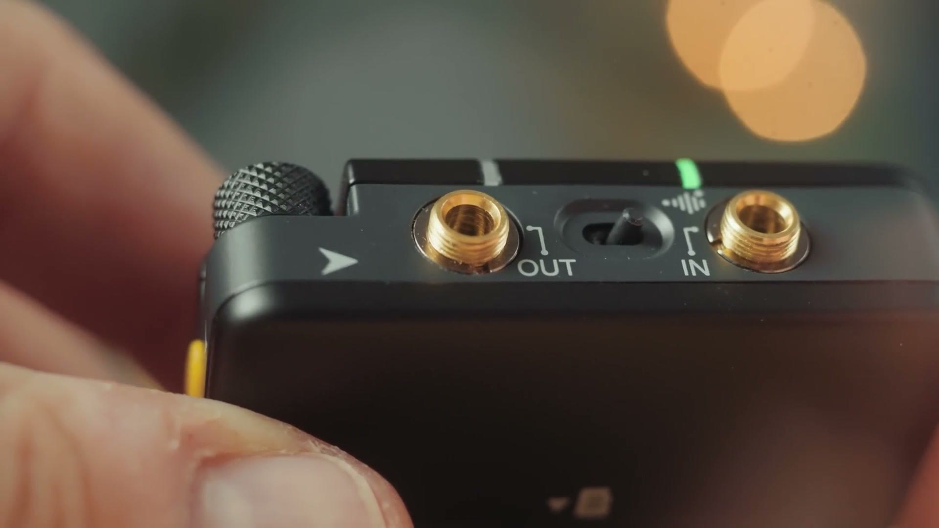 Top of the Deity PR-2 showing the locking in and out jacks and the mode switch