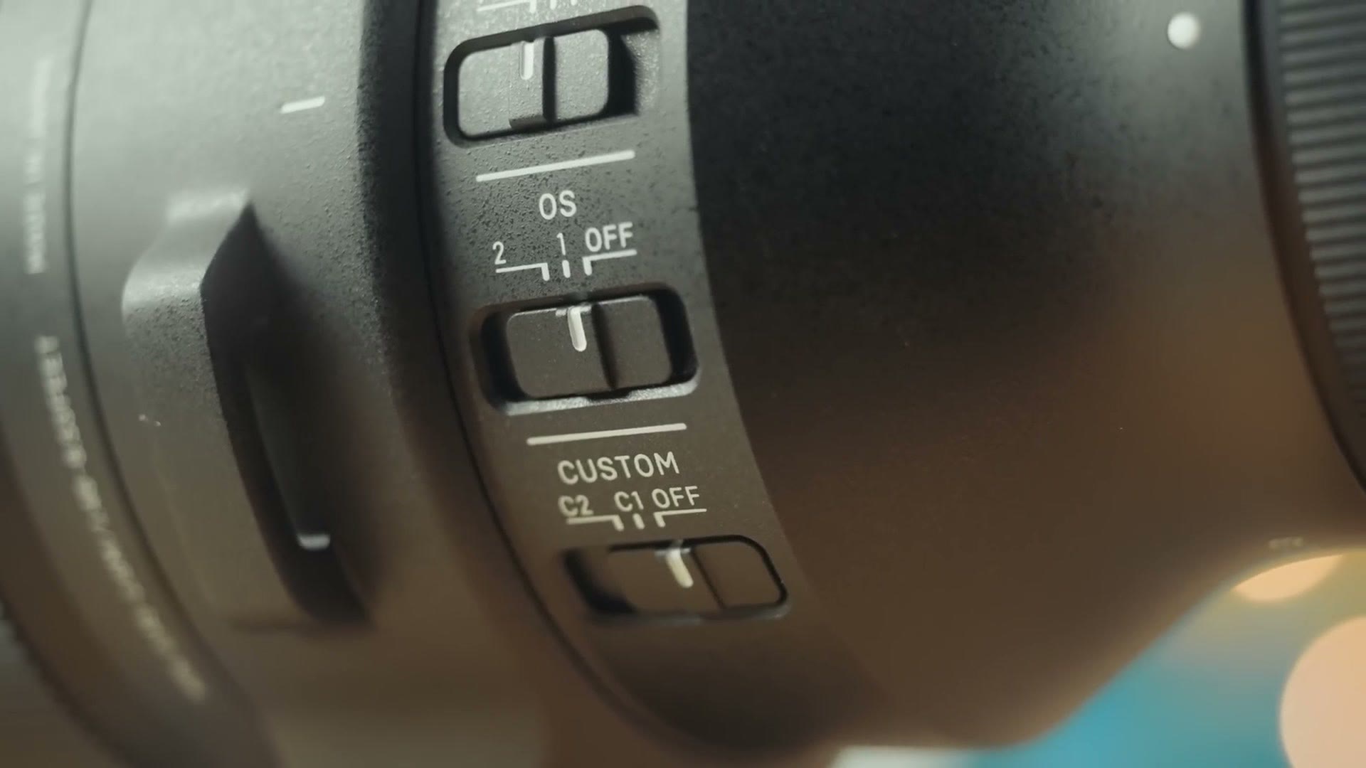 Close up of the OS and custom switches on the side of the Sigma 60-600mm