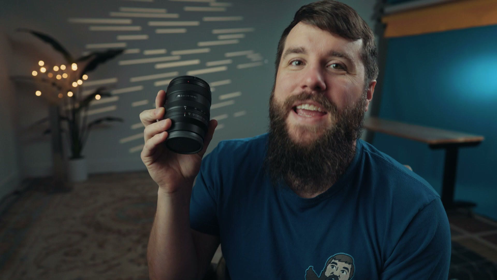 Matt Johnson holding the Sony 24-50mm f/2.8 G lens