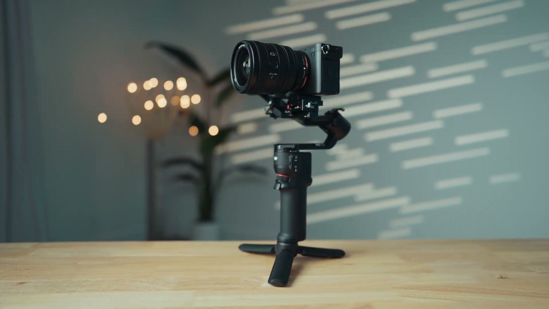 Sony camera with the 24-50mm lens balanced on a gimbal