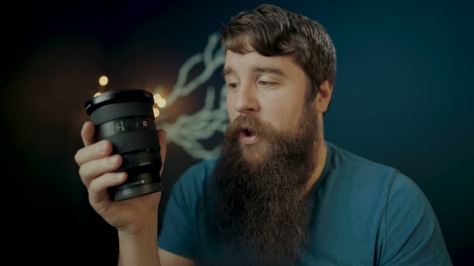 Sony 24-70mm GM Mark II lens held in hand
