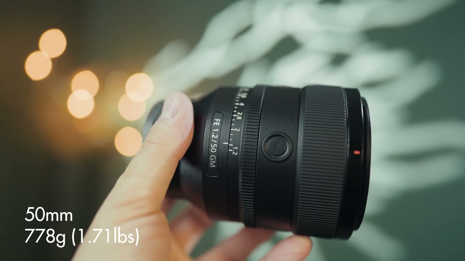 Weight comparison with the Sony 50mm at 778 grams