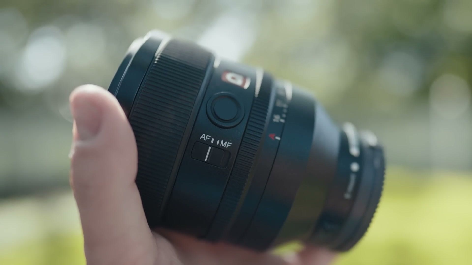 The AF/MF switch and G Master badge on the barrel of the Sony 50mm f/1.2 GM