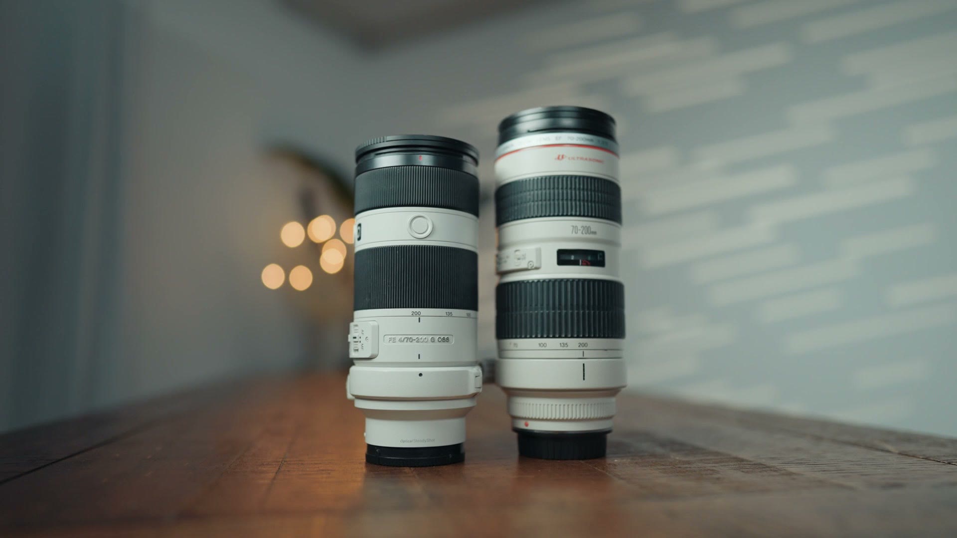 The Sony 70-200 F4 next to a larger Canon 70-200 f/2.8 for size comparison