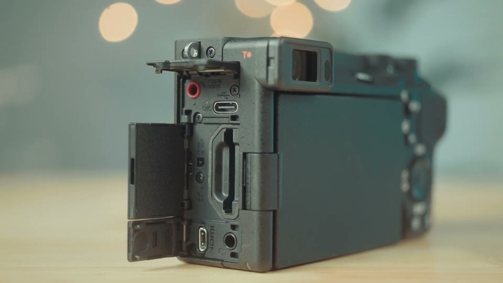 Side panel of the Sony a6700 open showing USB-C, microphone, headphone and micro HDMI ports