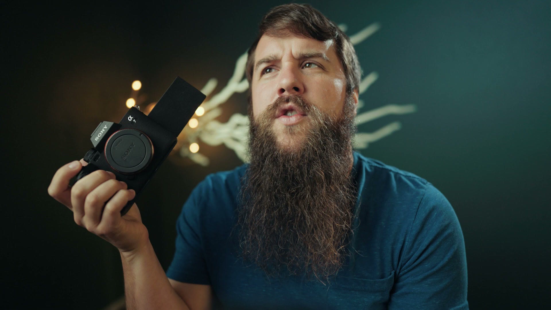 Sony a7 IV camera held in hand