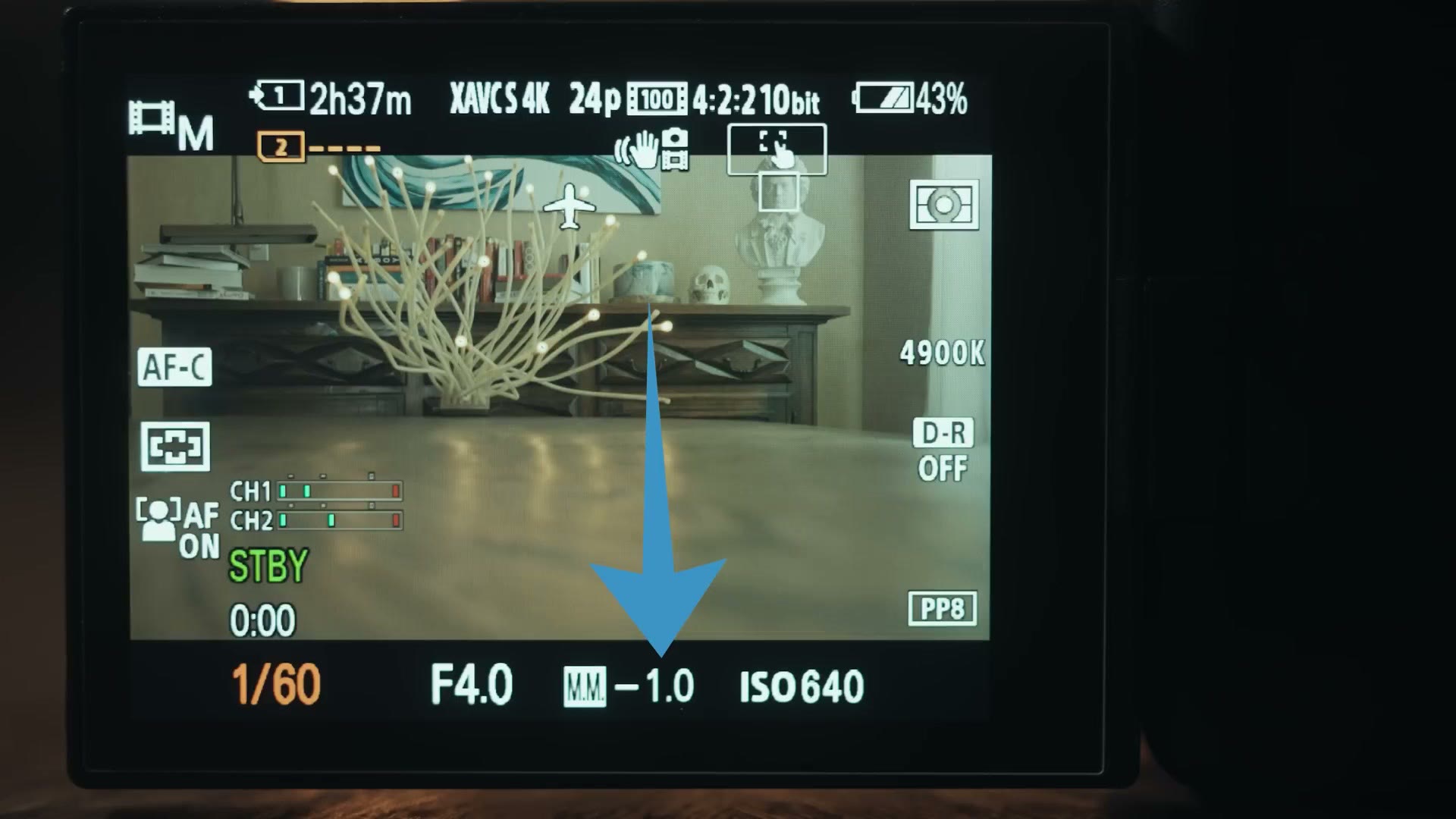Sony a7 IV rear screen showing the metering readout at minus one stop