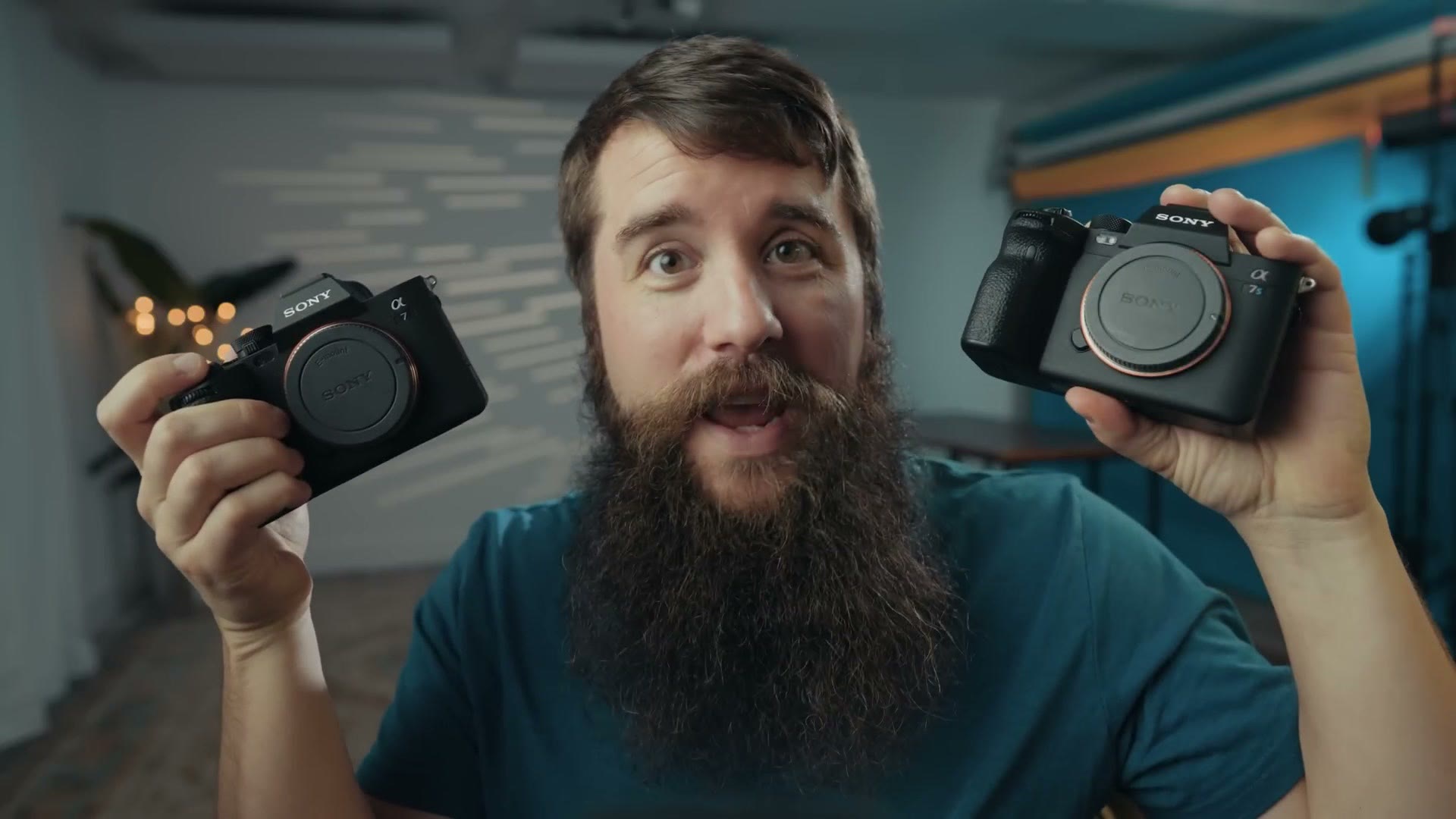 Matt Johnson holding a Sony a7 IV in one hand and a Sony a7S III in the other