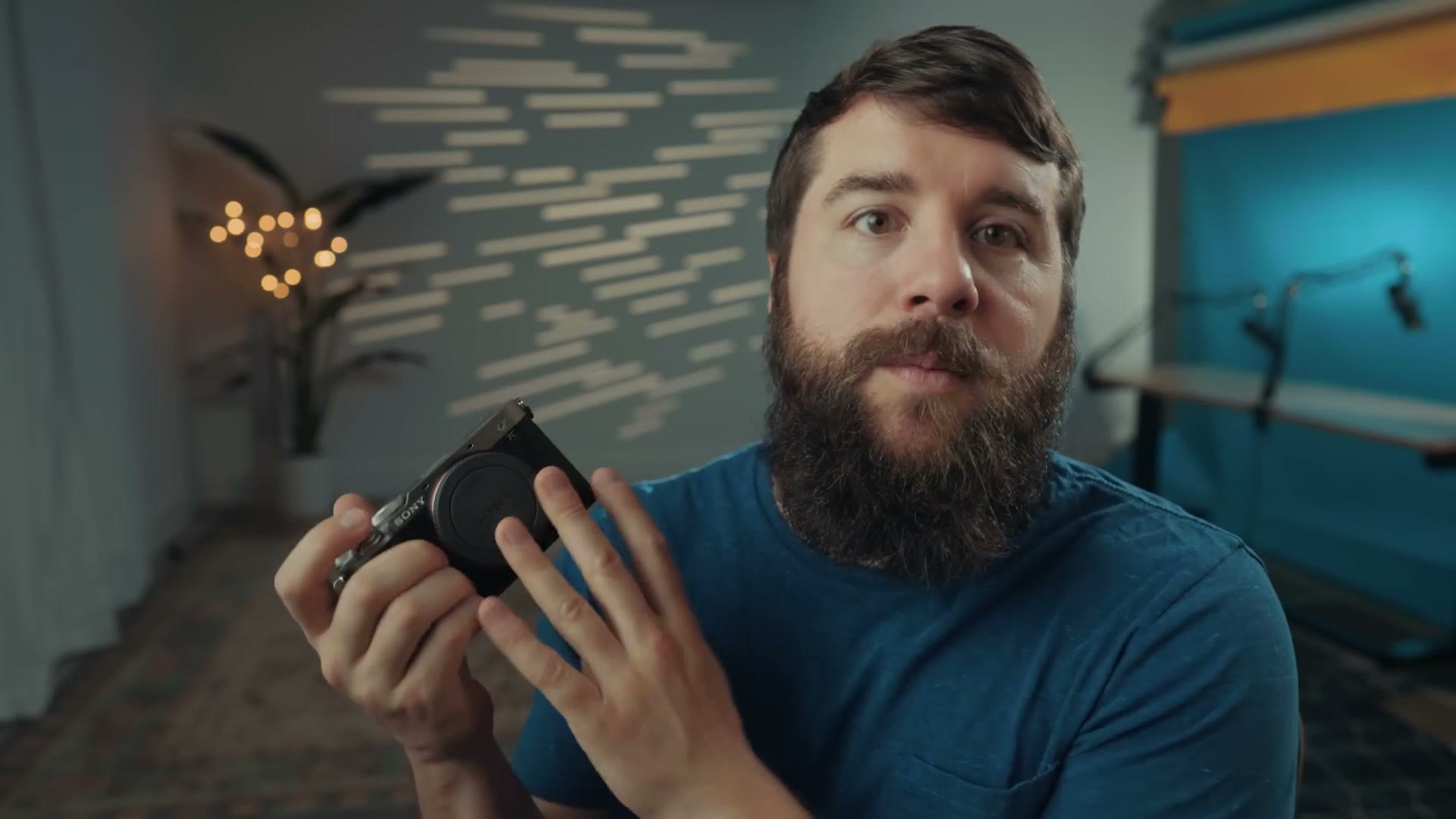Matt holding one of the Sony a7C bodies while discussing price