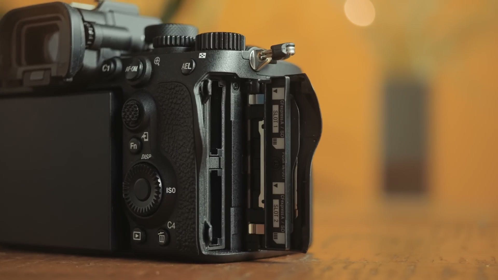 The dual card slots on the Sony a7R V open, showing CFexpress and SD support