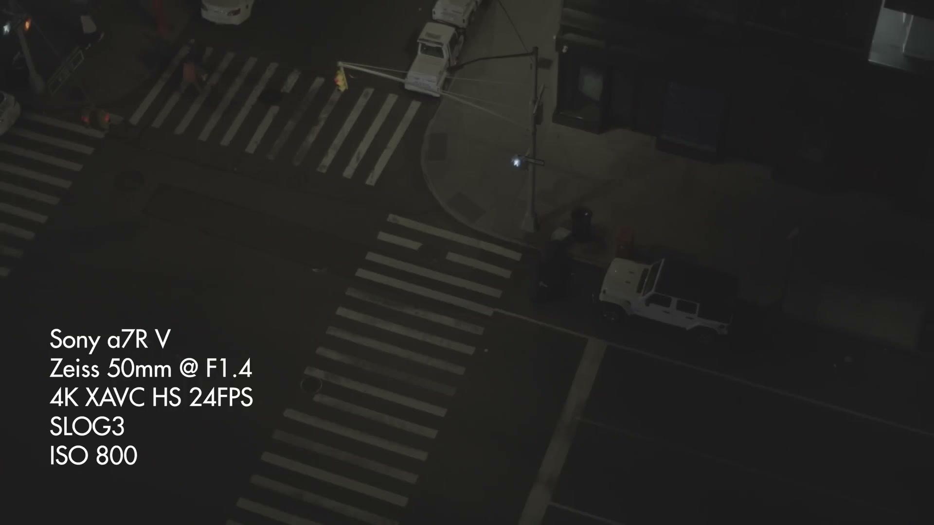 A night street scene filmed on the a7R V with a Zeiss 50mm at F1.4, ISO 800
