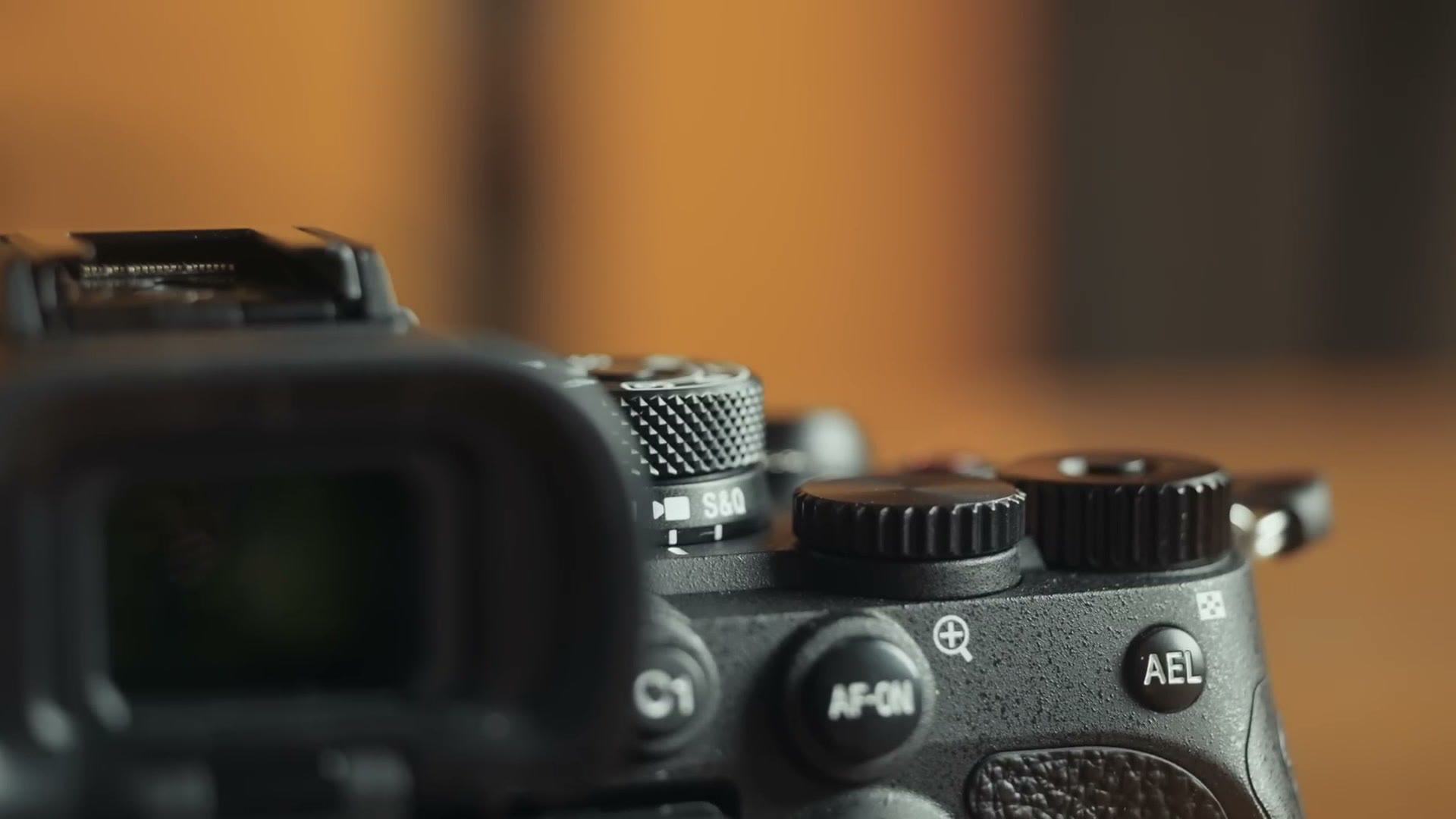 The top plate of the Sony a7R V showing the photo, video and slow and quick mode switch