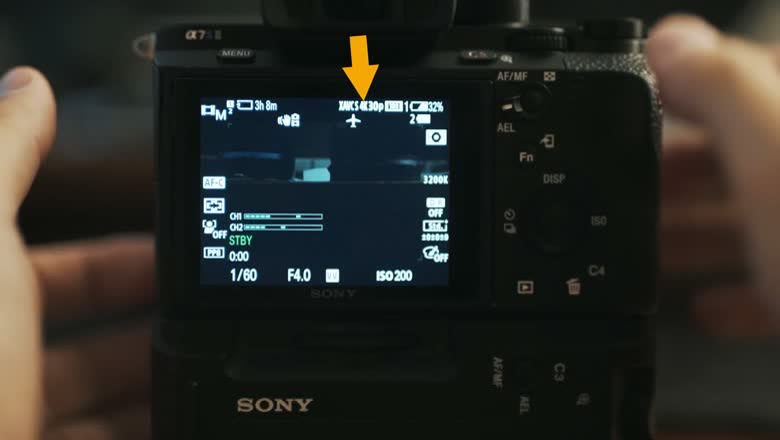 The a7S II shooting display showing XAVC S 4K 30p at the top with 3200K, 1/60, F4.0 and ISO 200 across the bottom