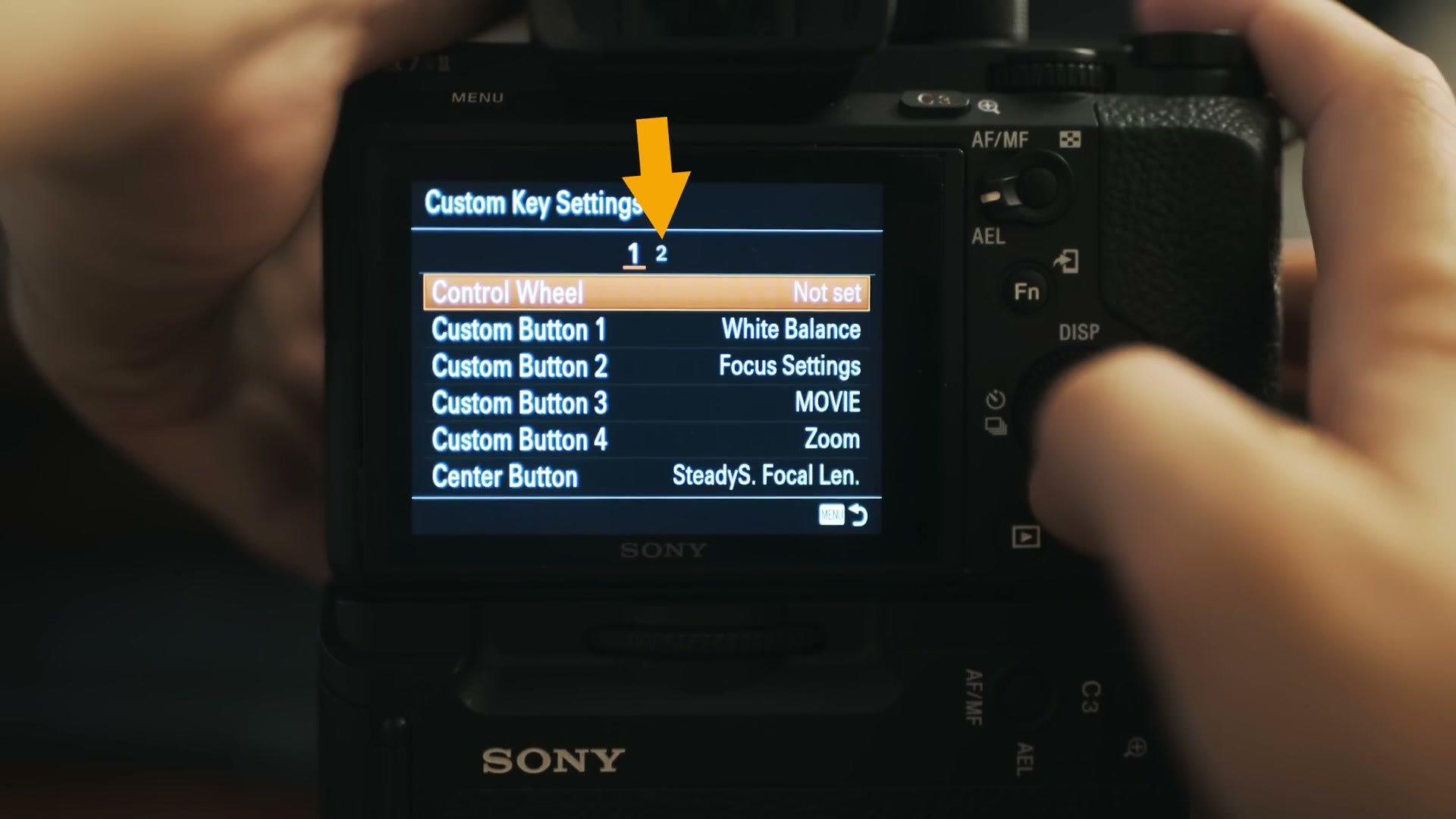 Sony a7S II Custom Key Settings page 1 showing Control Wheel Not set, Custom Button 1 White Balance, Custom Button 2 Focus Settings, Custom Button 3 MOVIE, Custom Button 4 Zoom, Center Button SteadyS. Focal Len.