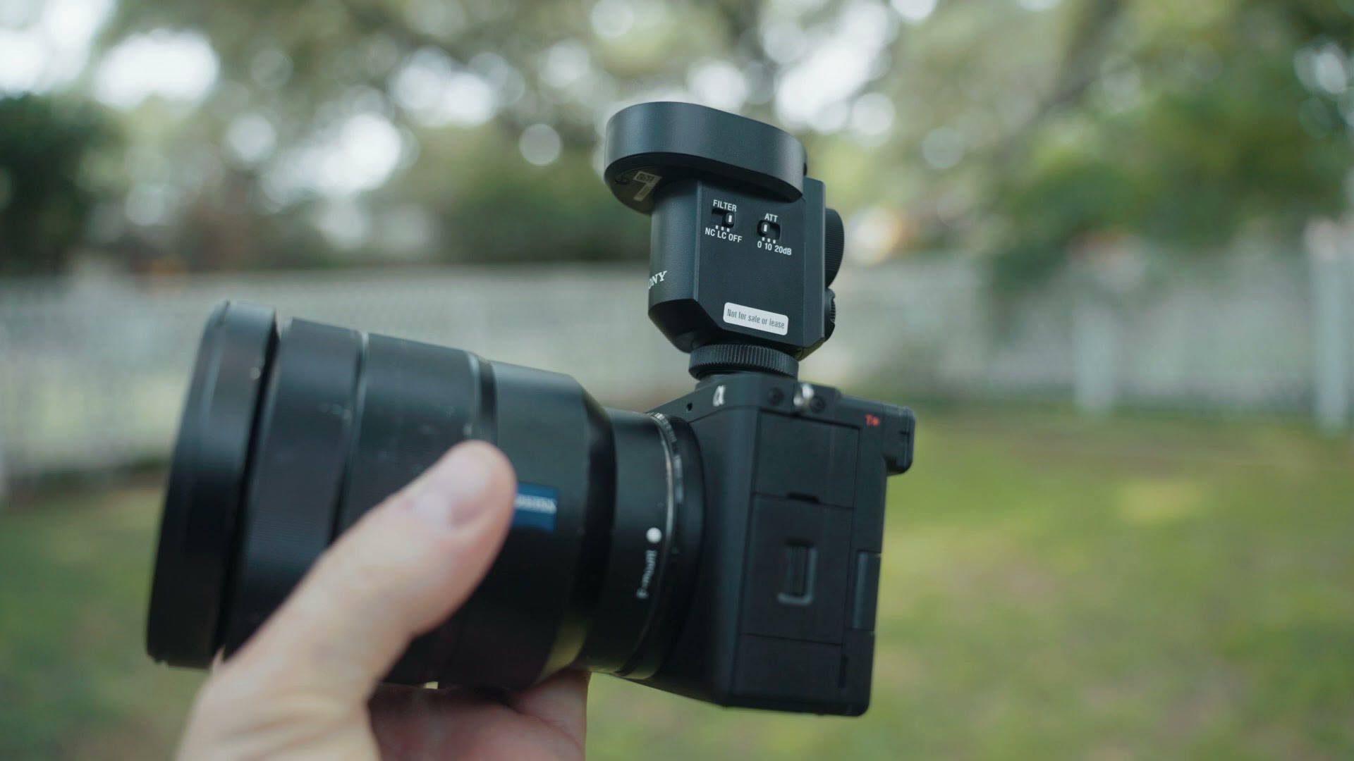The Sony ECM-M1 mounted on a Sony camera's hot shoe outdoors