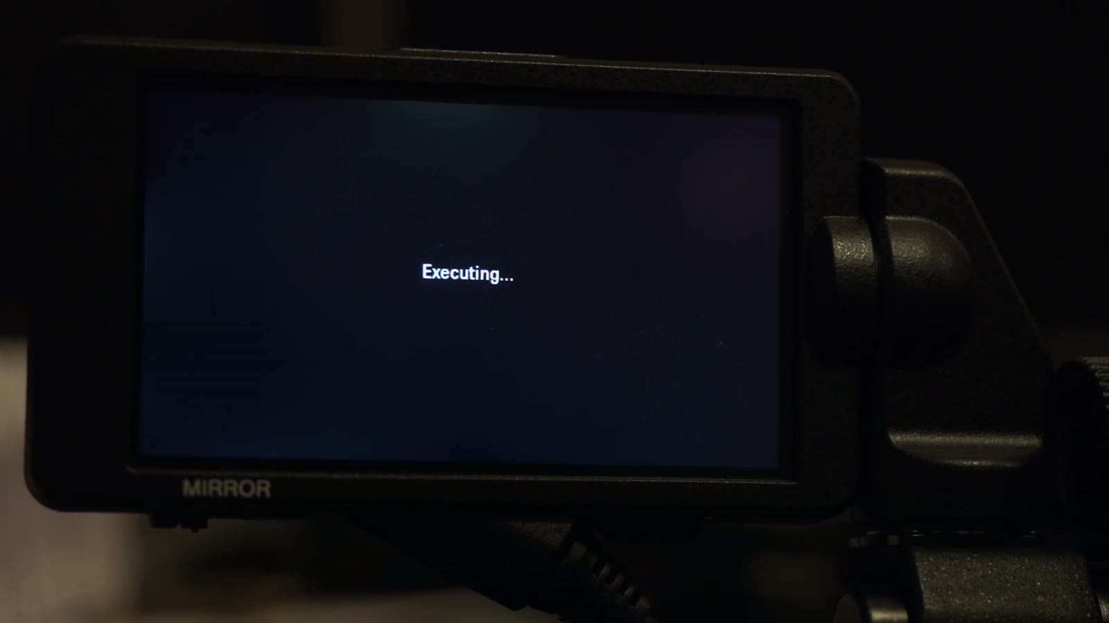 FS5 LCD showing a plain "Executing..." status message mid frame-rate change