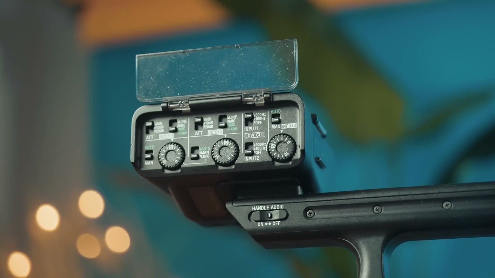 The optional Sony FX30 top handle showing its XLR inputs and audio controls