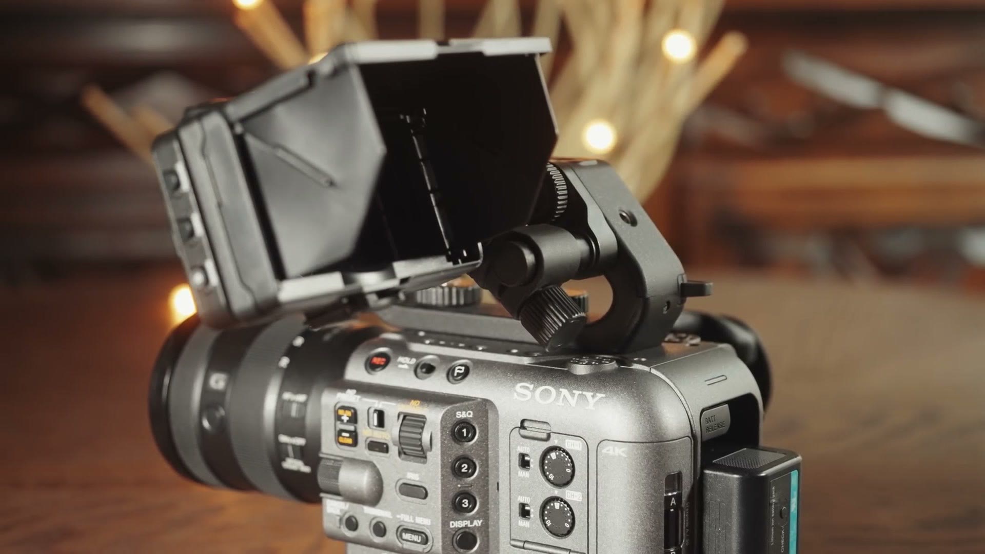The Sony FX6 with its monitor mounted on an arm above the body and the top handle attached