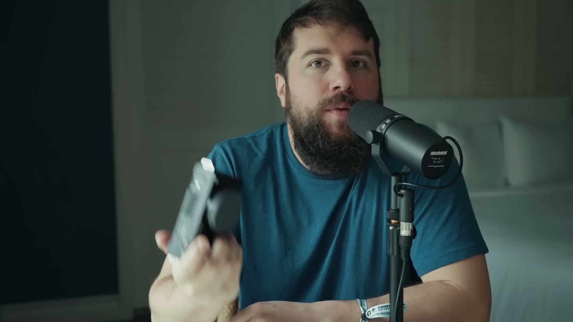 Matt Johnson holding the Sony ZV-E1 in a hotel room