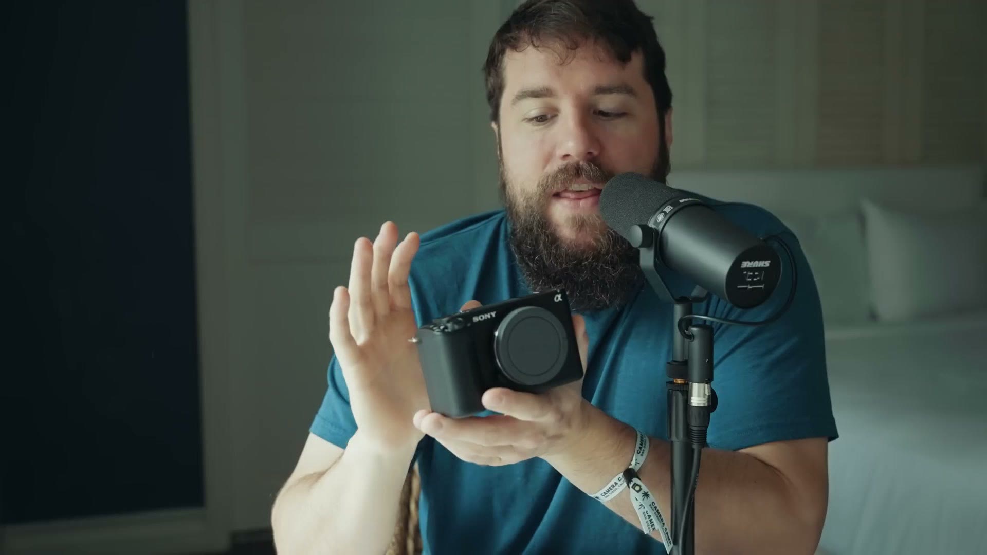 Matt Johnson holding up the Sony ZV-E1 to show its size