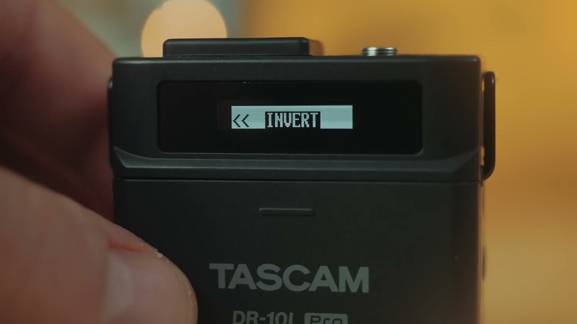 The Tascam DR-10L Pro screen showing the phase invert setting
