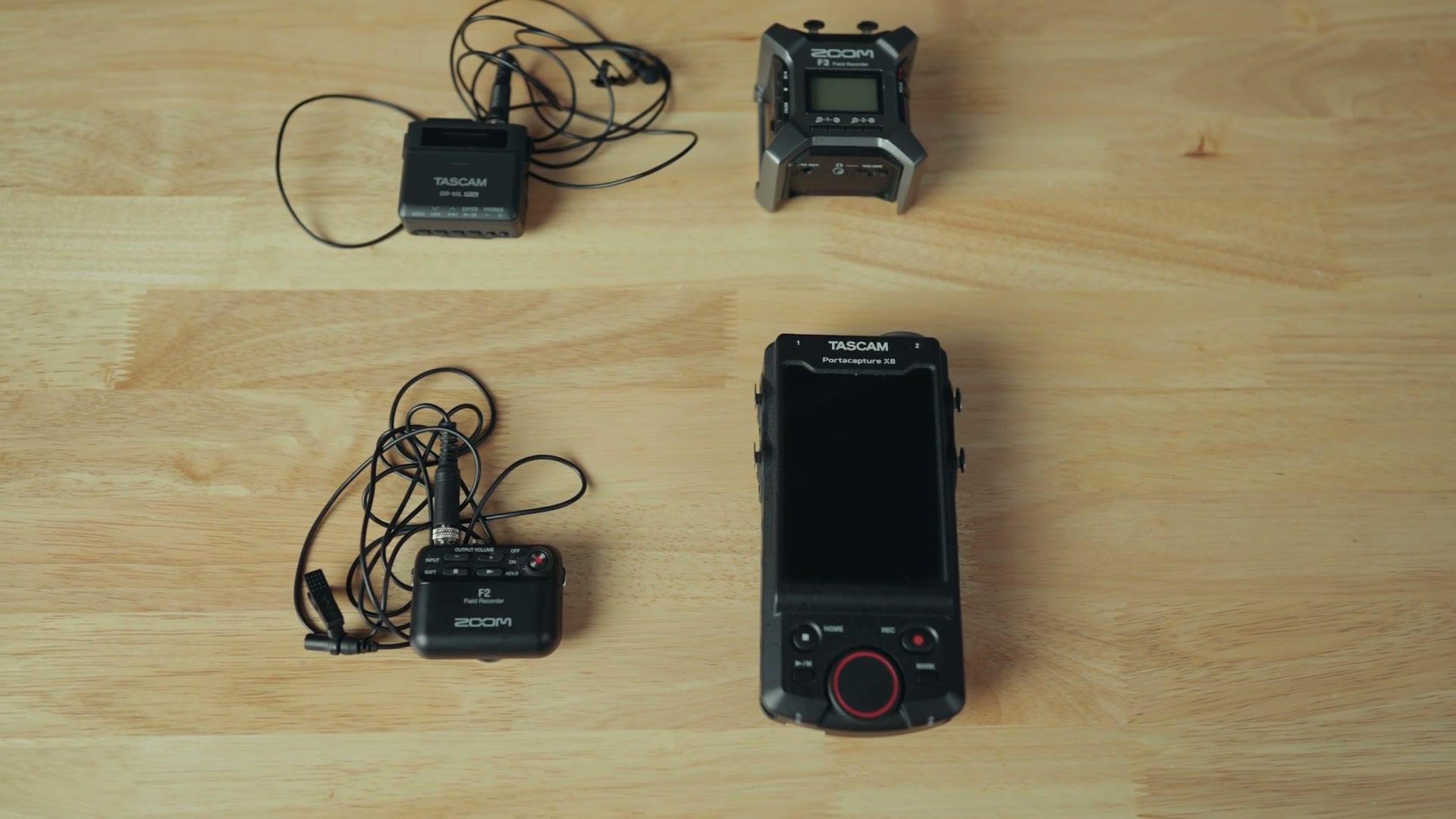 A flat lay of the timecode gear: a Tascam DR-10L Pro, an Atomos UltraSync BLUE, an UltraSync ONE and a Tascam Portacapture