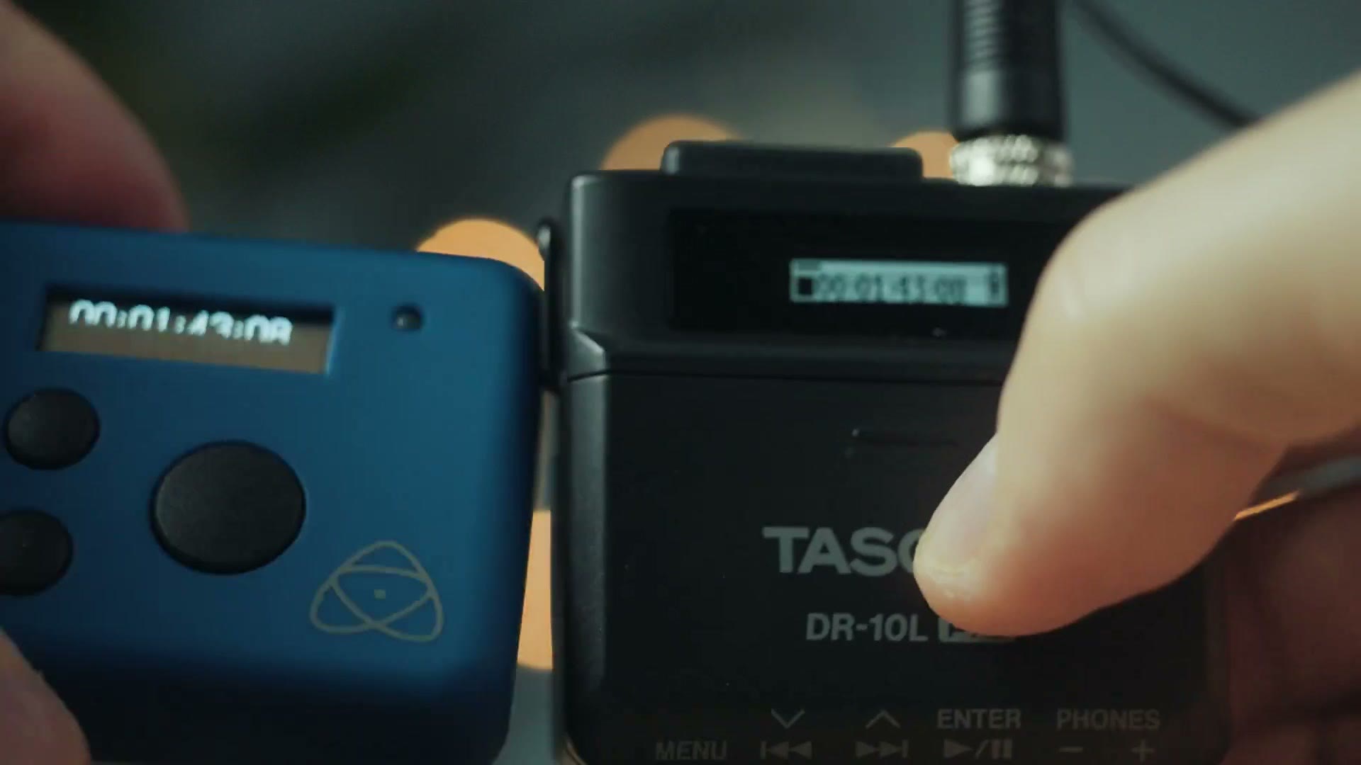 The UltraSync BLUE and the Tascam DR-10L Pro side by side, both displaying the same timecode number