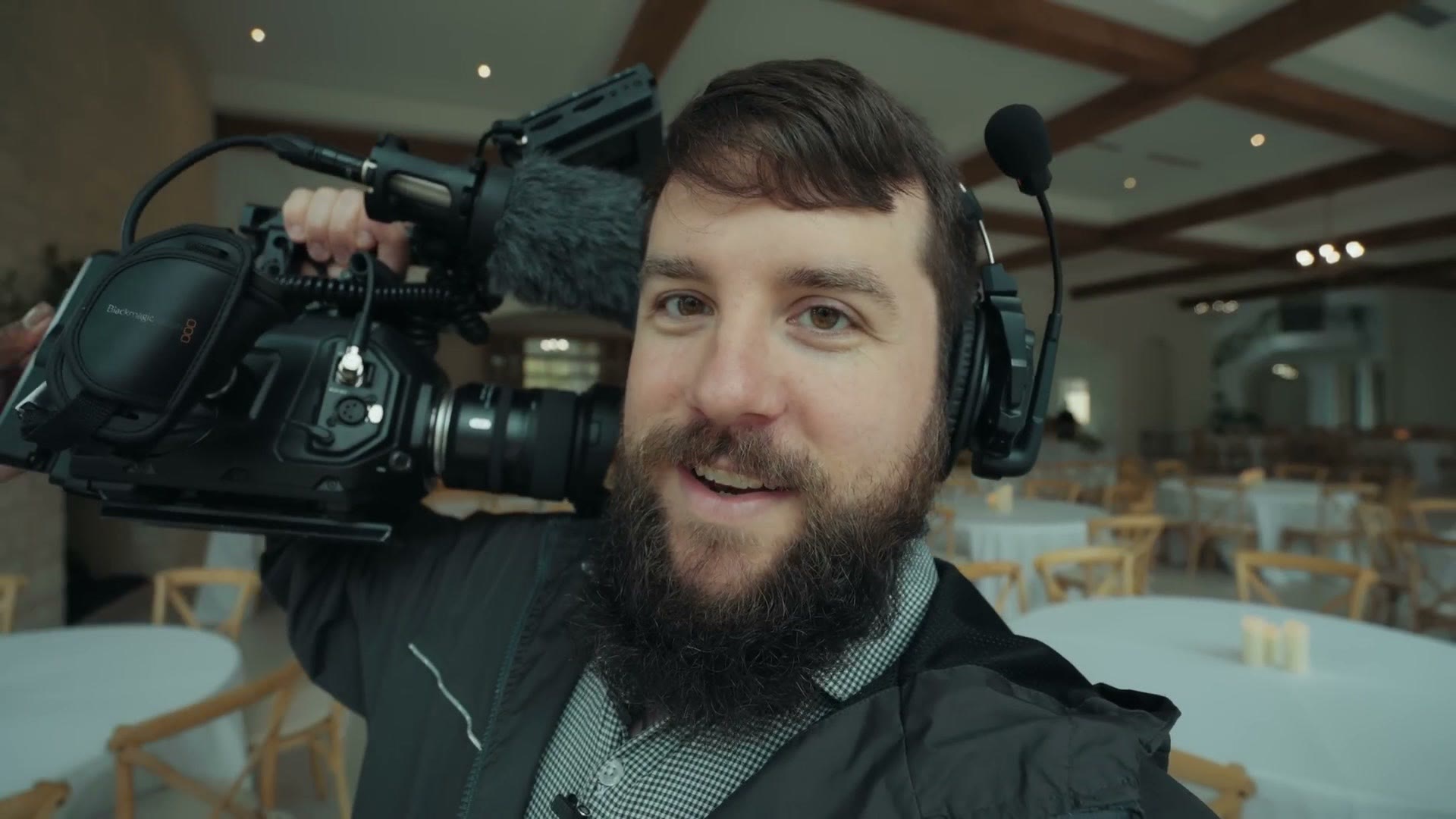 Matt Johnson holding Justin's Blackmagic Ursa Mini Pro rig on an Easyrig