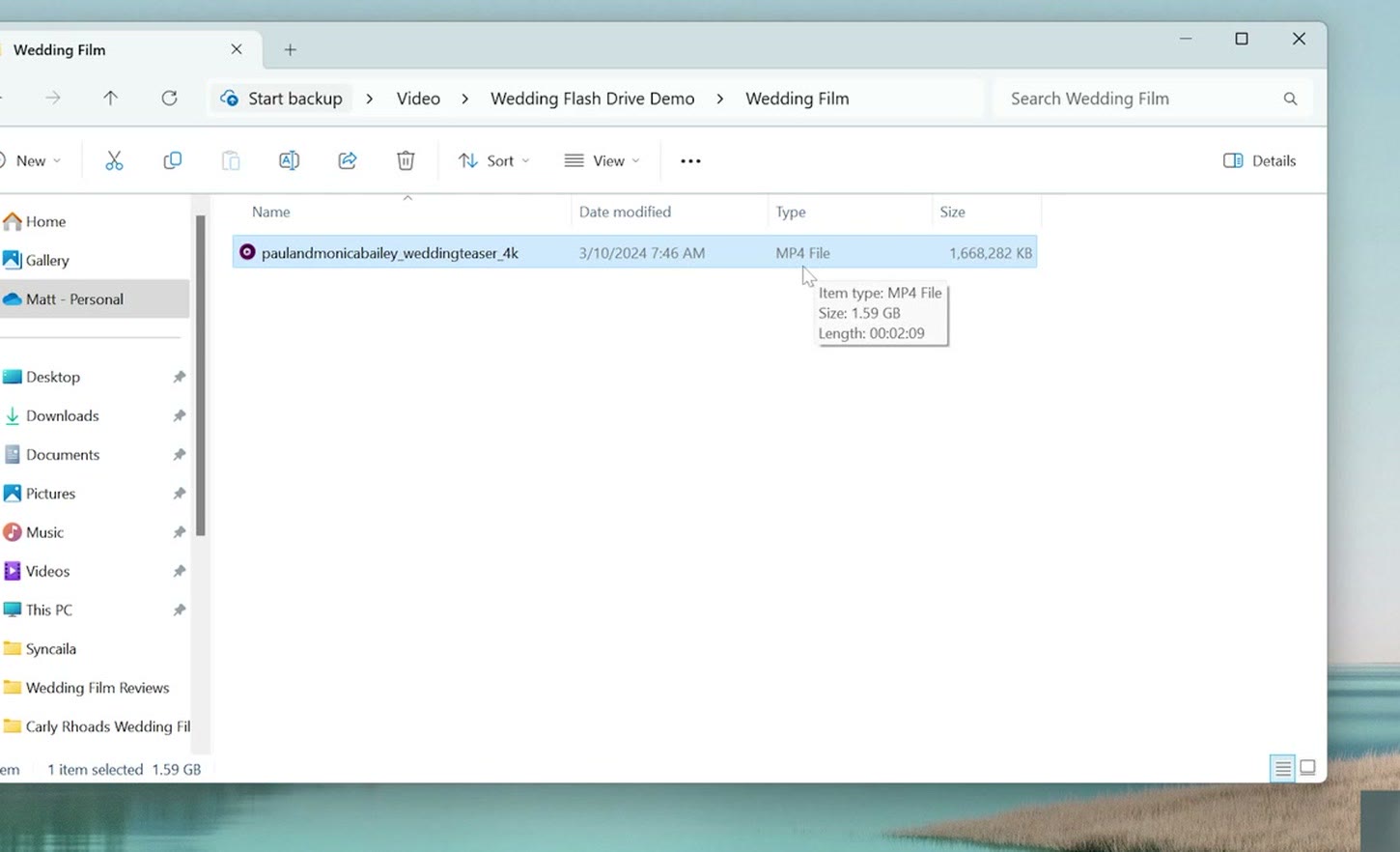 Windows File Explorer showing the exported MP4 wedding film