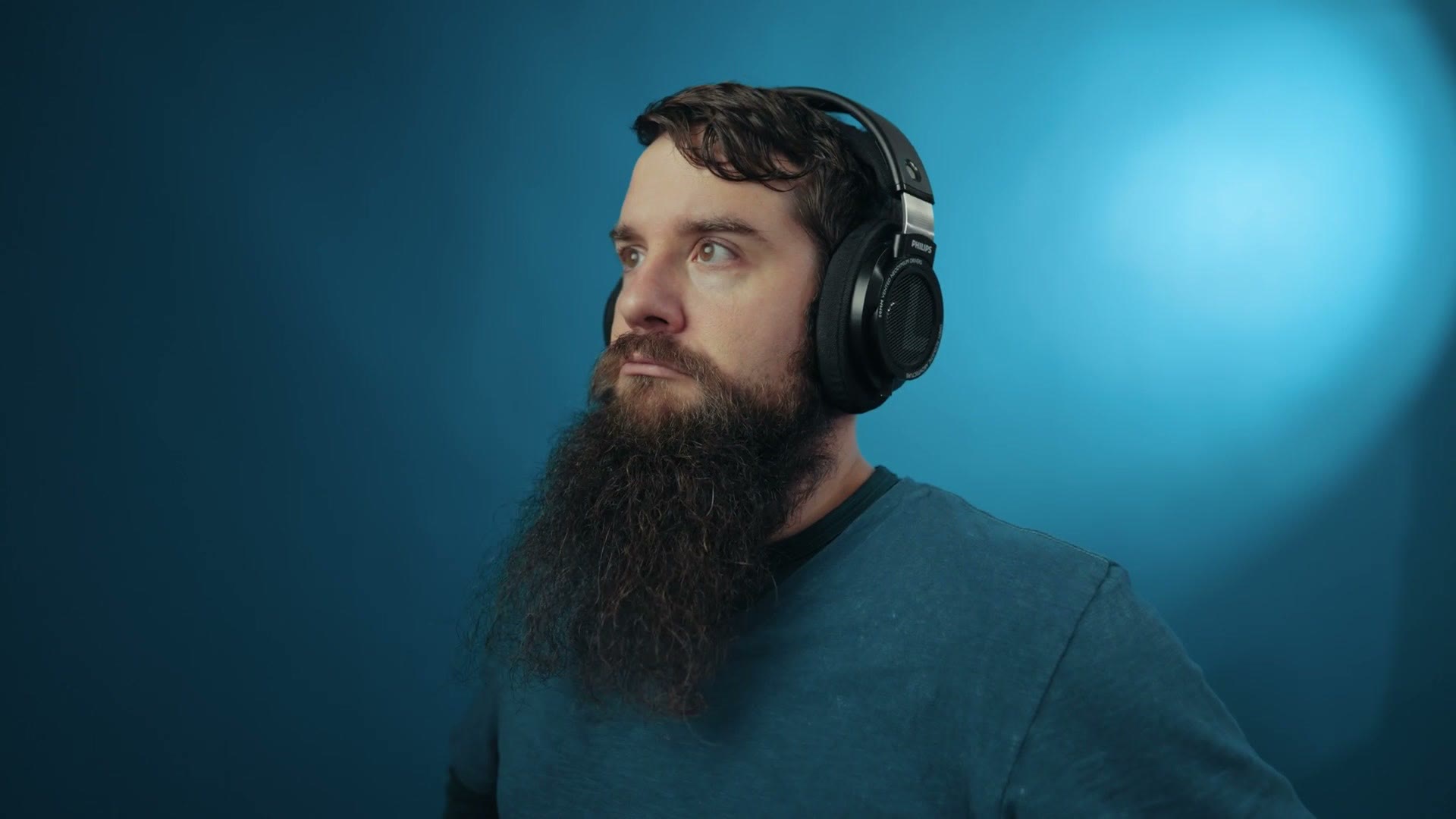 Matt Johnson wearing the Philips SHP9500 headphones