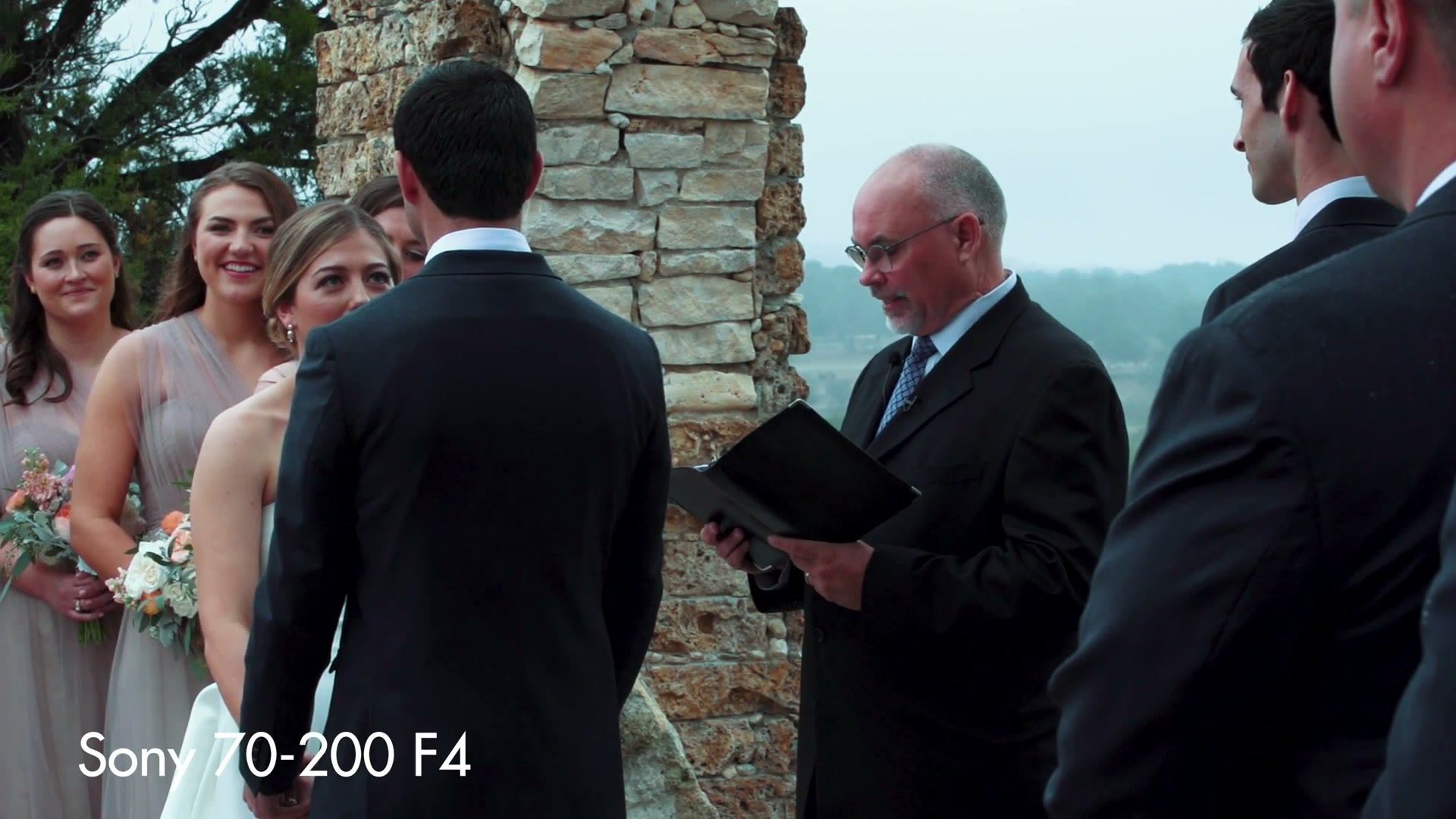 A wedding ceremony with the officiant and couple, filmed on the Sony 70-200 F4
