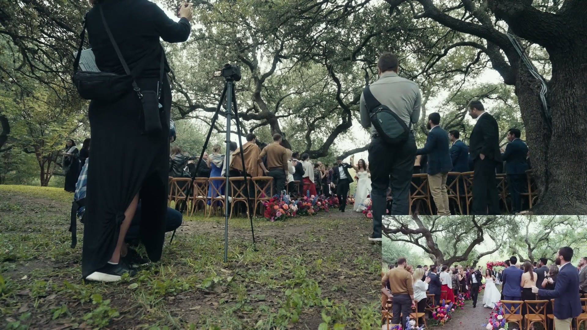 Behind the scenes of a wedding ceremony being filmed, with a camera on a tripod at the back