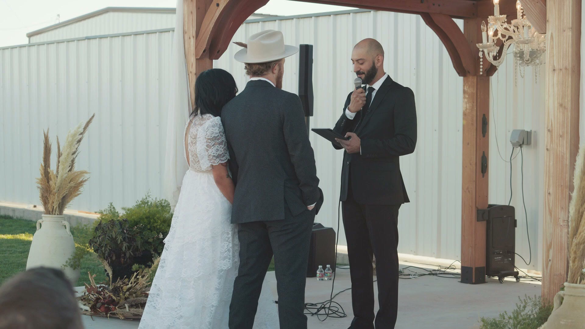 Wedding ceremony footage with the officiant and couple
