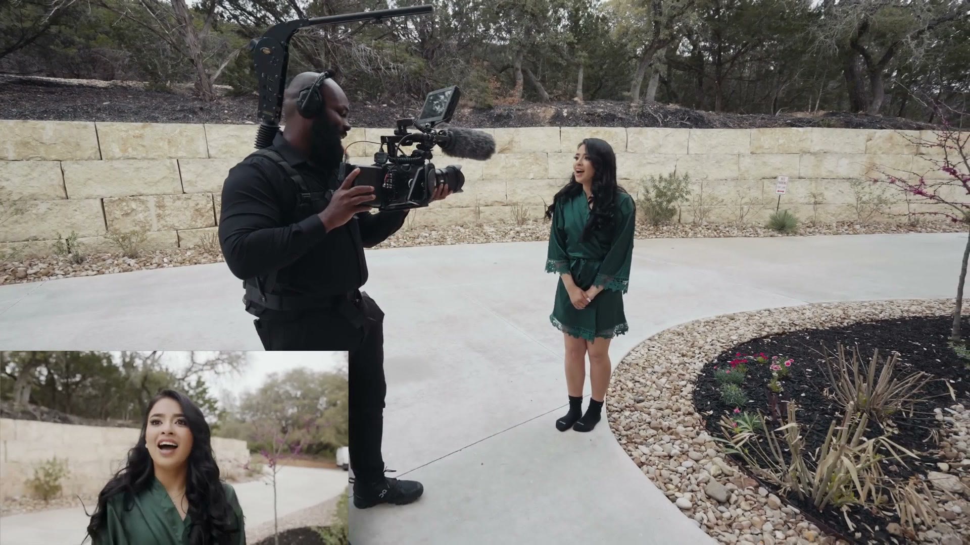 Justin Porter interviewing a guest with a camera on his shoulder