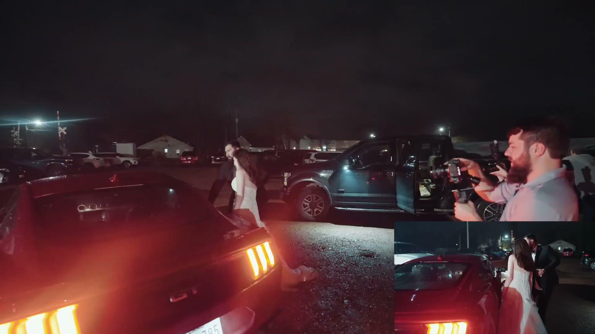 The couple leaving at night past parked cars lit by taillights
