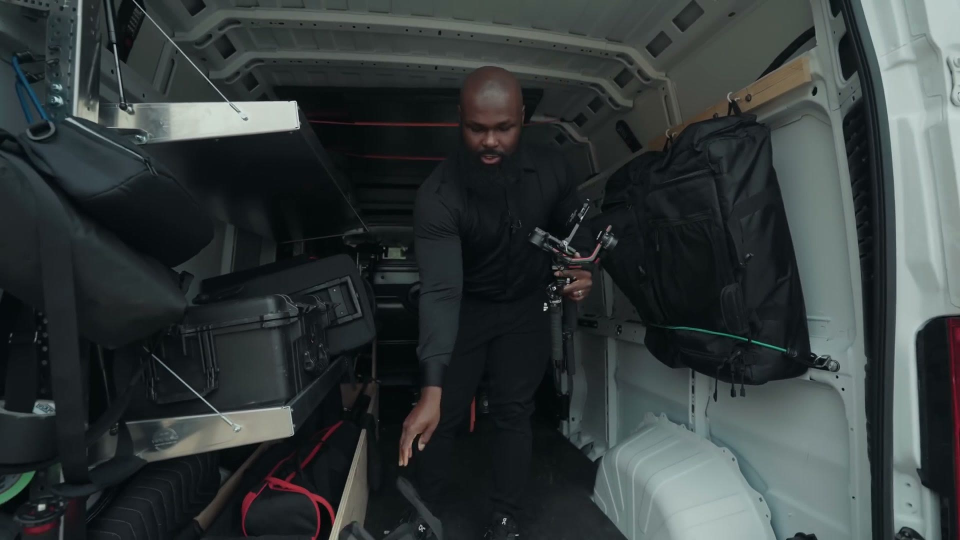 Inside Justin Porter's van packed with lighting and camera cases
