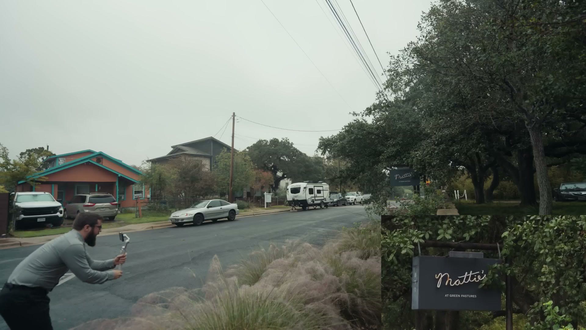 A small wedding welcome sign for Matty's under a tree on a rainy day