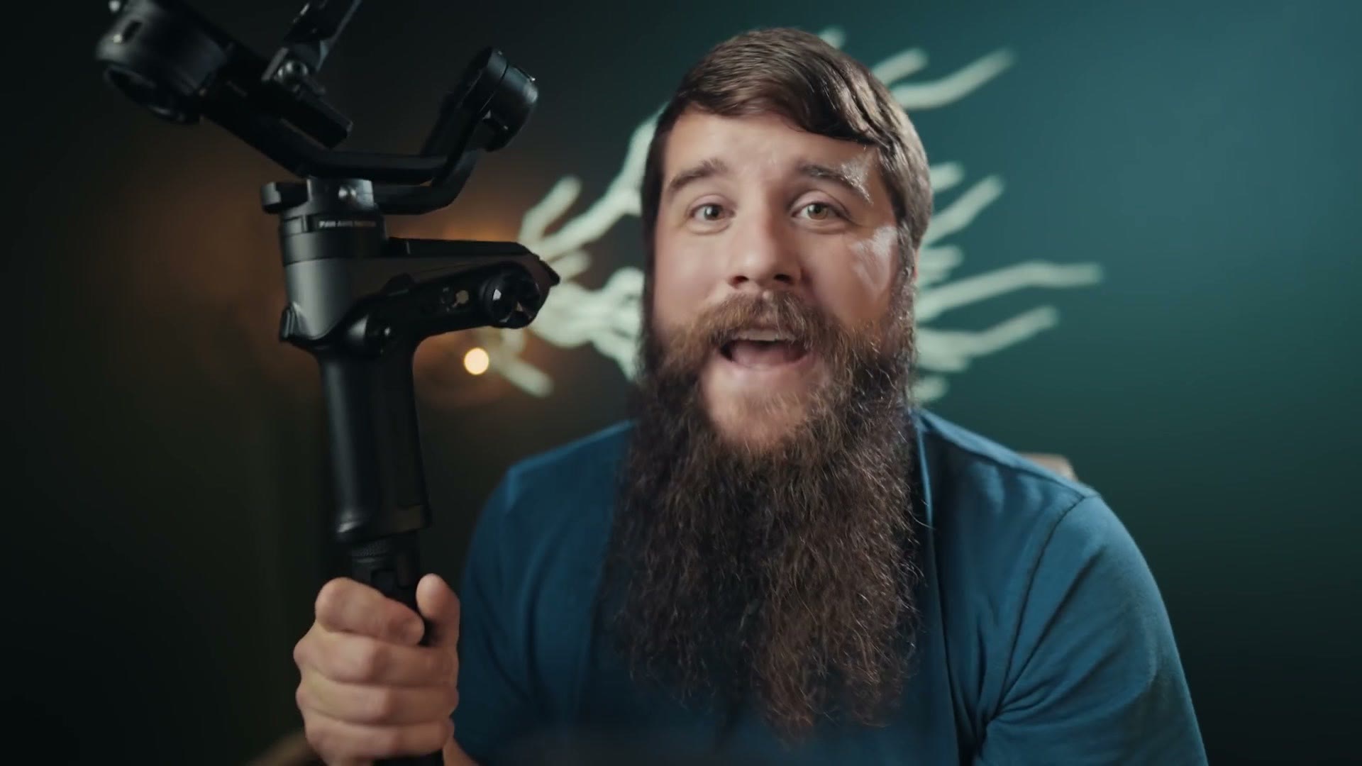 Matt holding up the Zhiyun Weebill 2 gimbal with a camera mounted