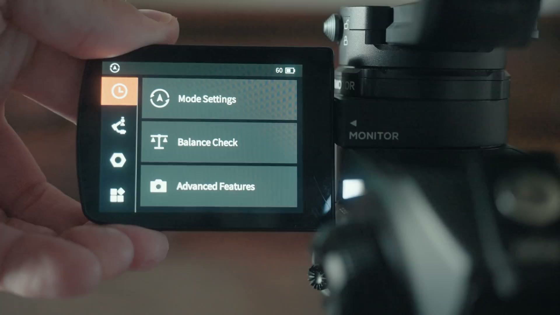 The Weebill 2 flip out touchscreen showing Mode Settings, Balance Check and Advanced Features, with the battery at 60 percent