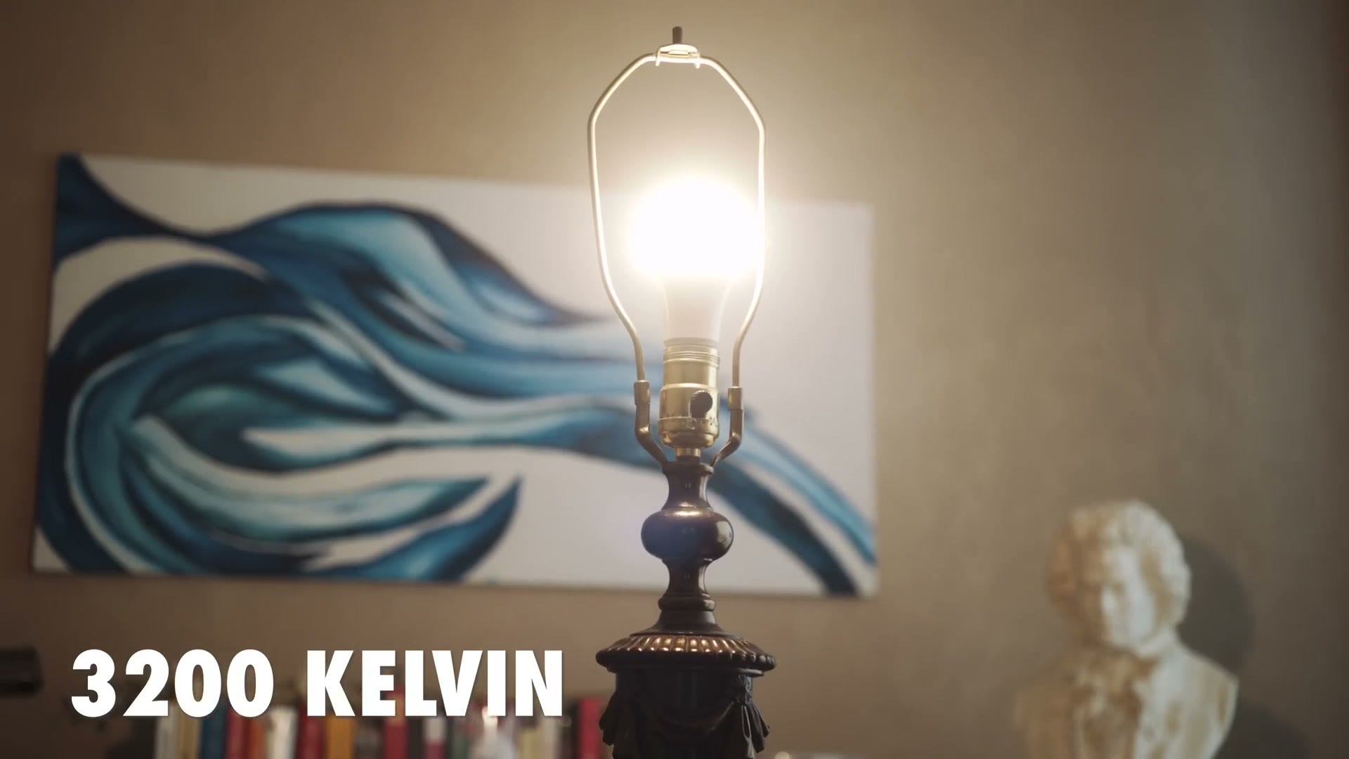 A warm incandescent table lamp lit in a room, with the text 3200 Kelvin overlaid.