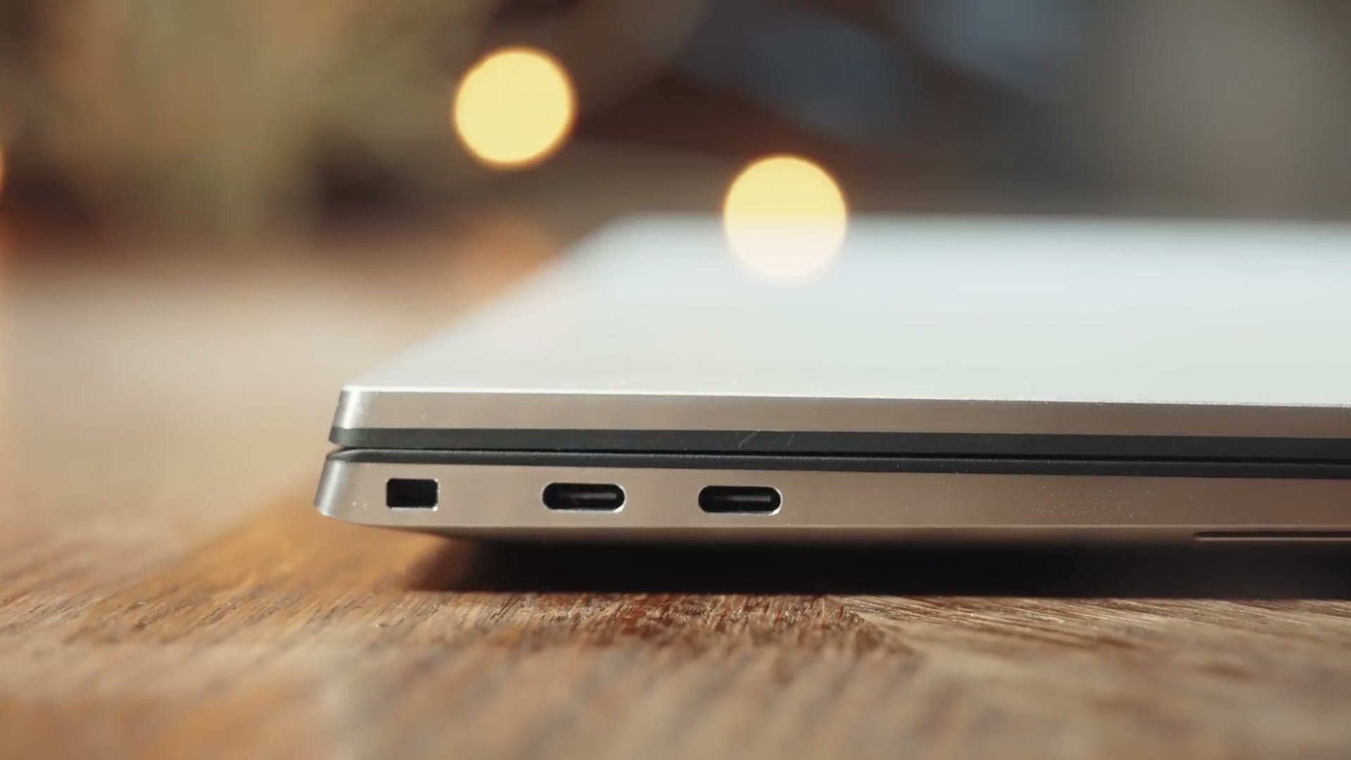 Close-up of the left edge of the XPS 17 showing a lock slot and two USB-C ports