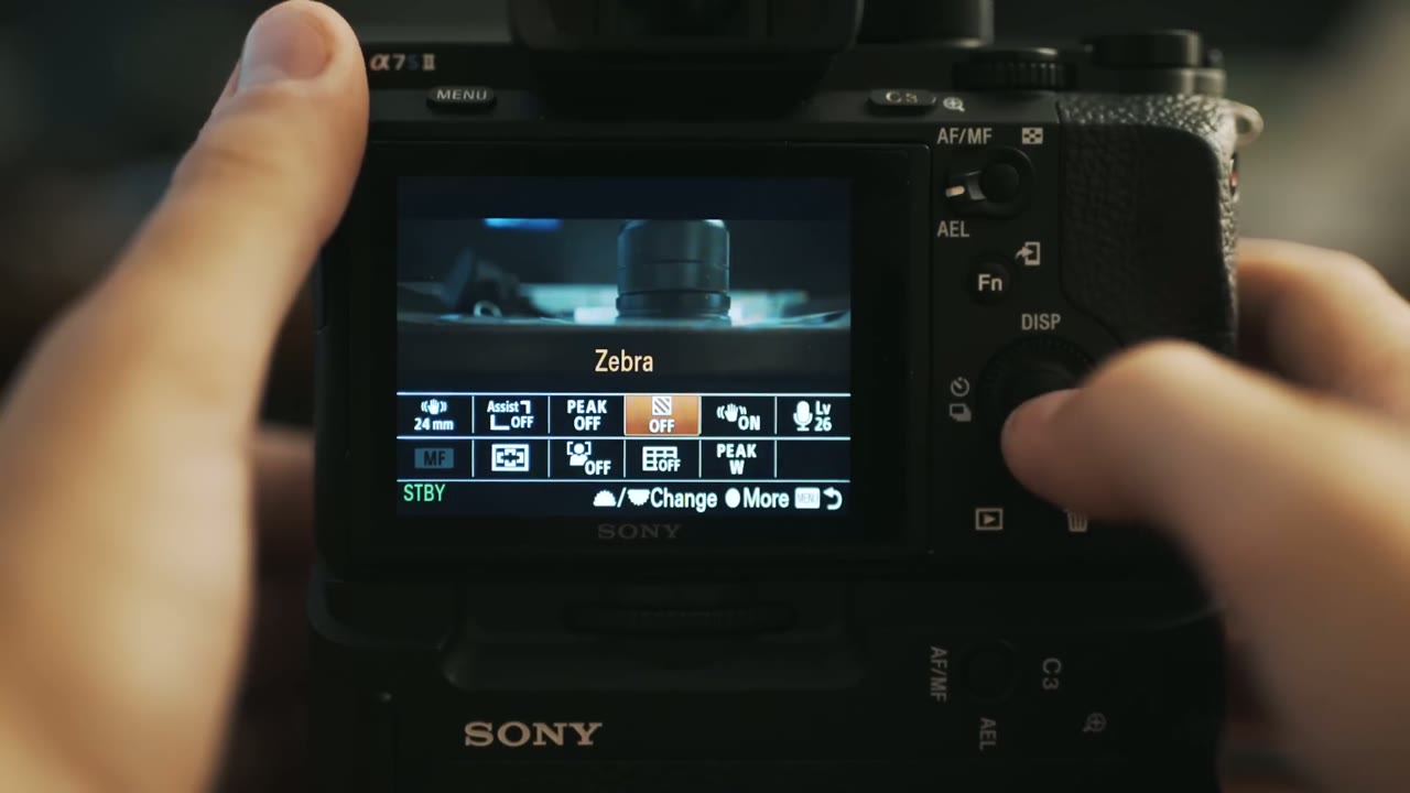 Sony a7S II live view with the Zebra option highlighted orange in the quick menu, currently set to Off