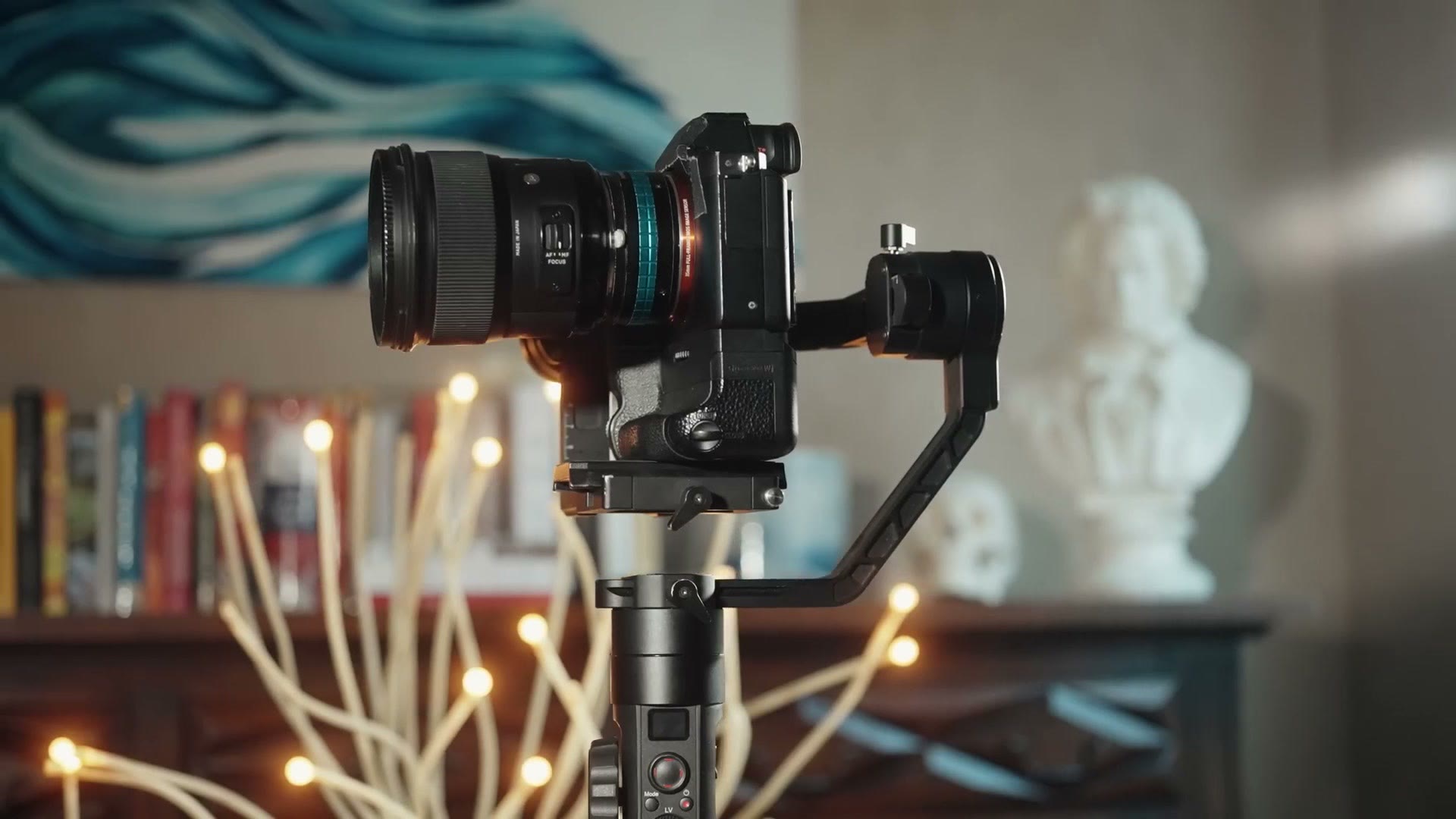 A Sony mirrorless camera and lens balanced on the Zhiyun Crane 2S