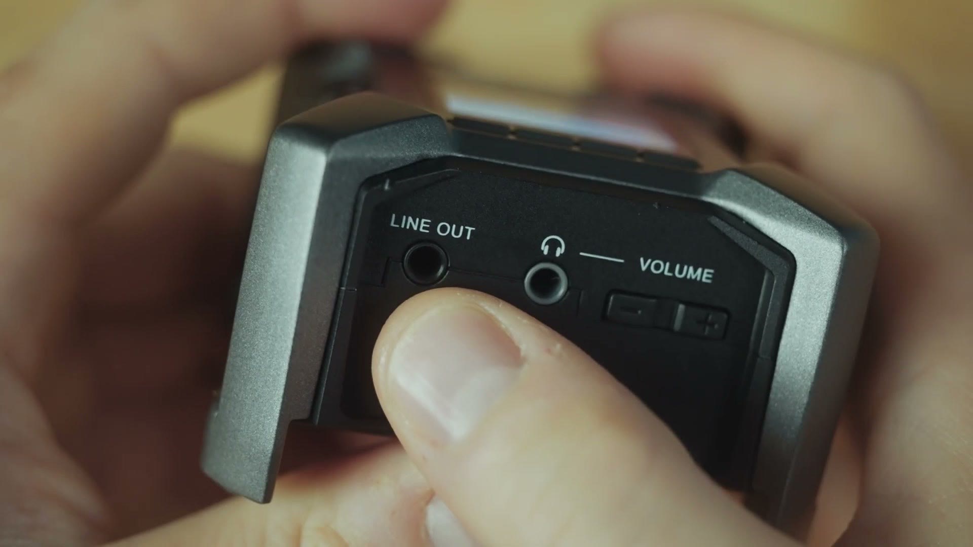 Line out and headphone jacks with volume control on the side of the Zoom F3