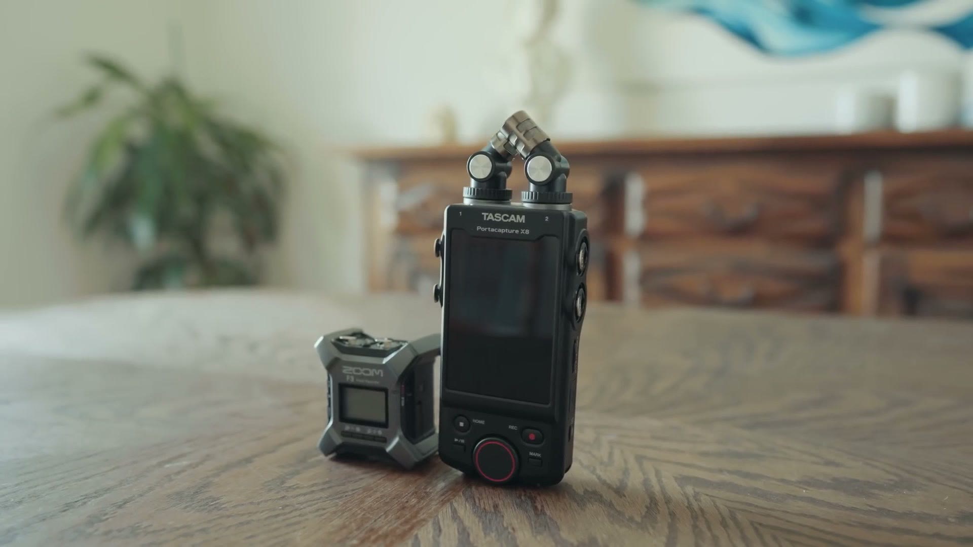 Zoom F3 and Tascam X8 side by side on a table