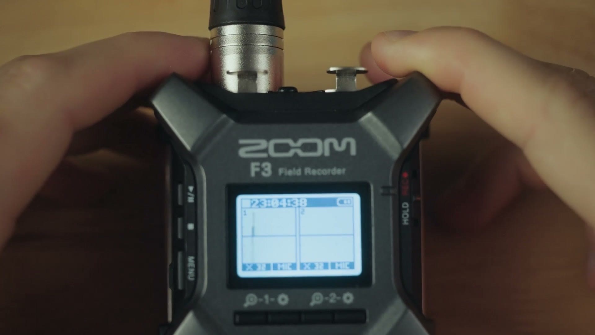 XLR cable being connected to the left input of the Zoom F3