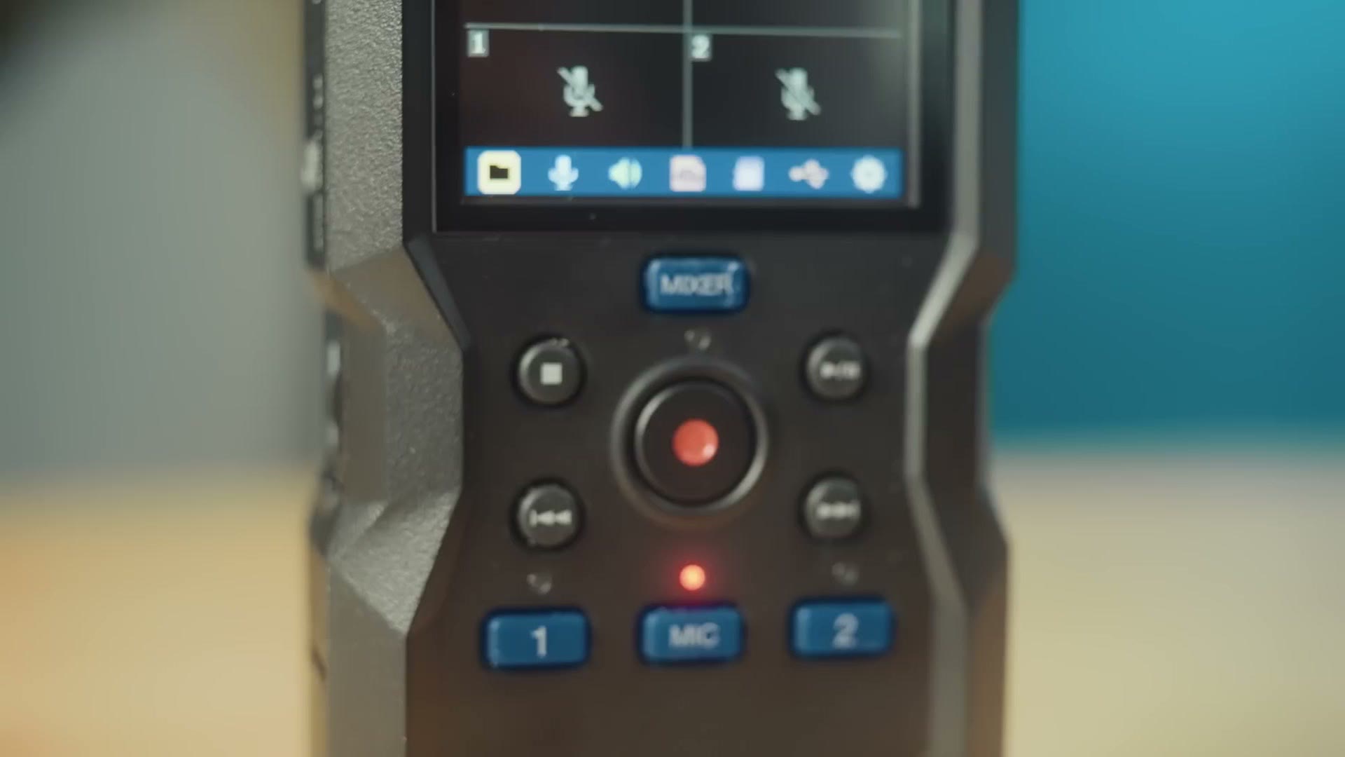 Front buttons of the Zoom H4essential including MIXER, record, and the 1, MIC and 2 input buttons