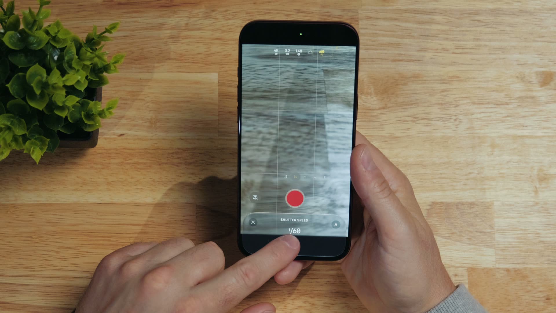 Shutter speed control in the native iPhone camera app with a locked shutter speed